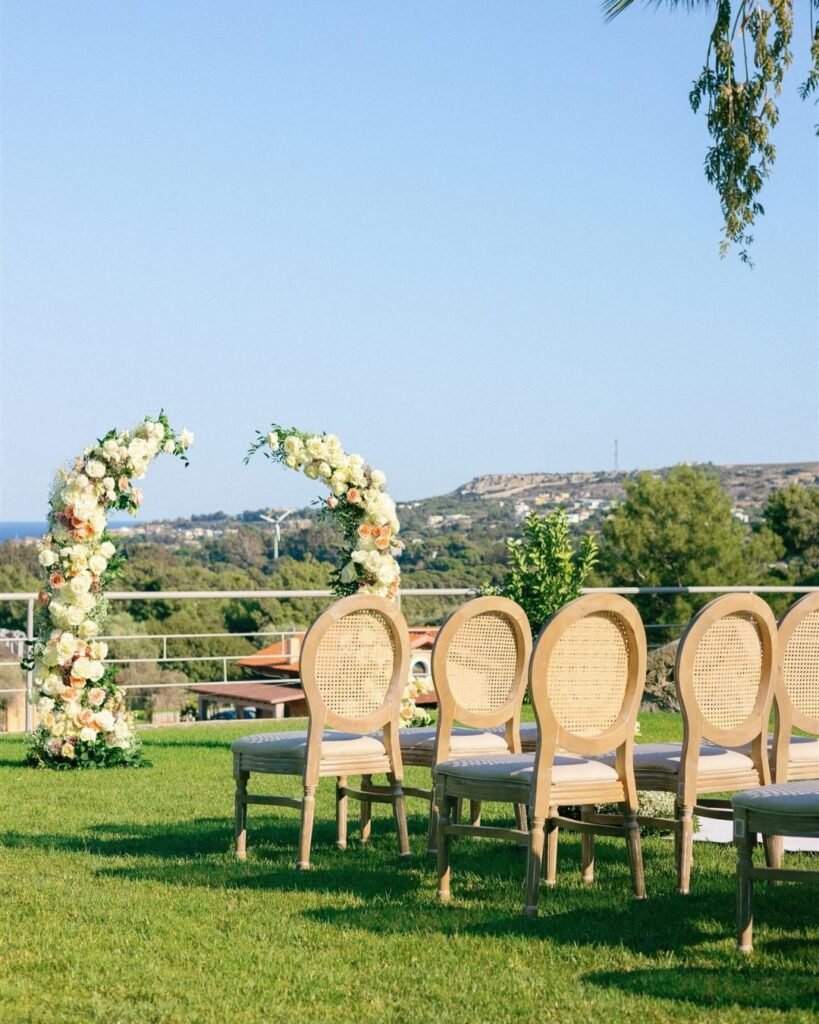 Outdoor ceremony setup at Bello Blu in Greece, showcasing the venue’s breathtaking views and stylish outdoor decor.