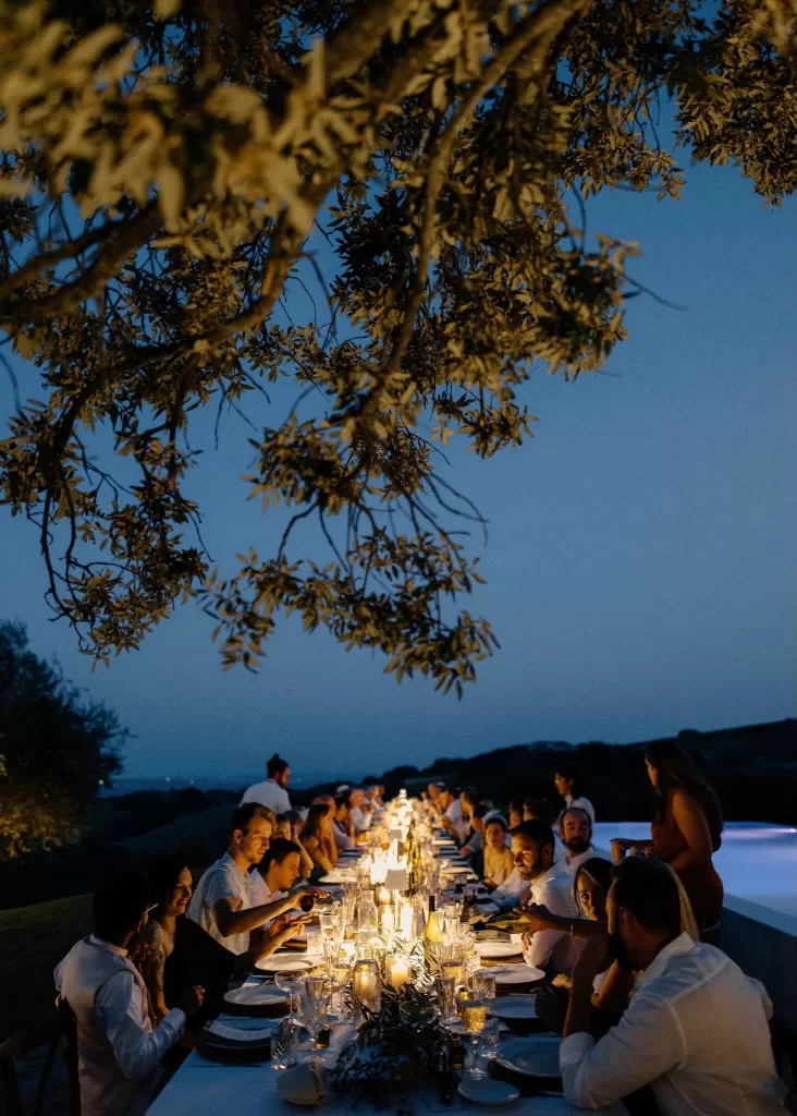 Candlelit outdoor wedding dinner under the stars at Casa Olivi