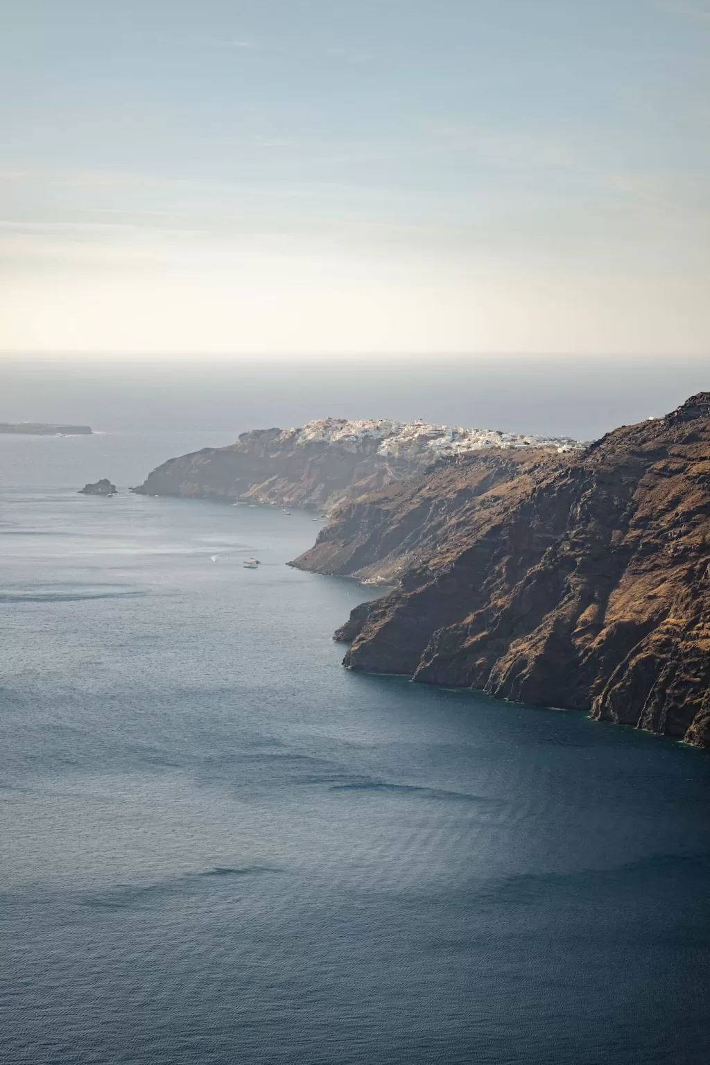 Panoramic cliffside view from Rocabella Santorini wedding venue