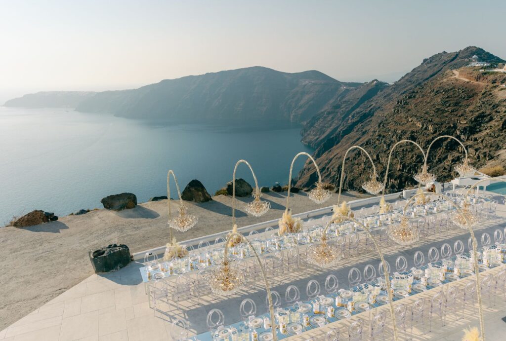 Cliffside view of Rocabella Santorini with sweeping views of the Aegean Sea, ideal for destination weddings.