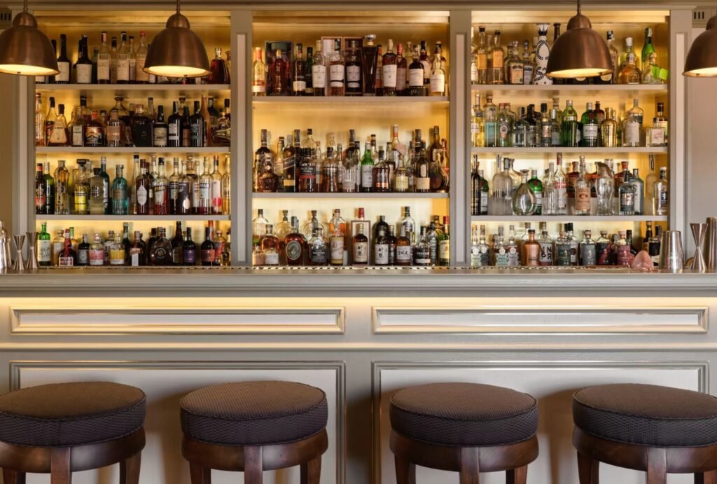 Elegant wine bar inside Rosewood Castiglion del Bosco, featuring local wines from Tuscany.