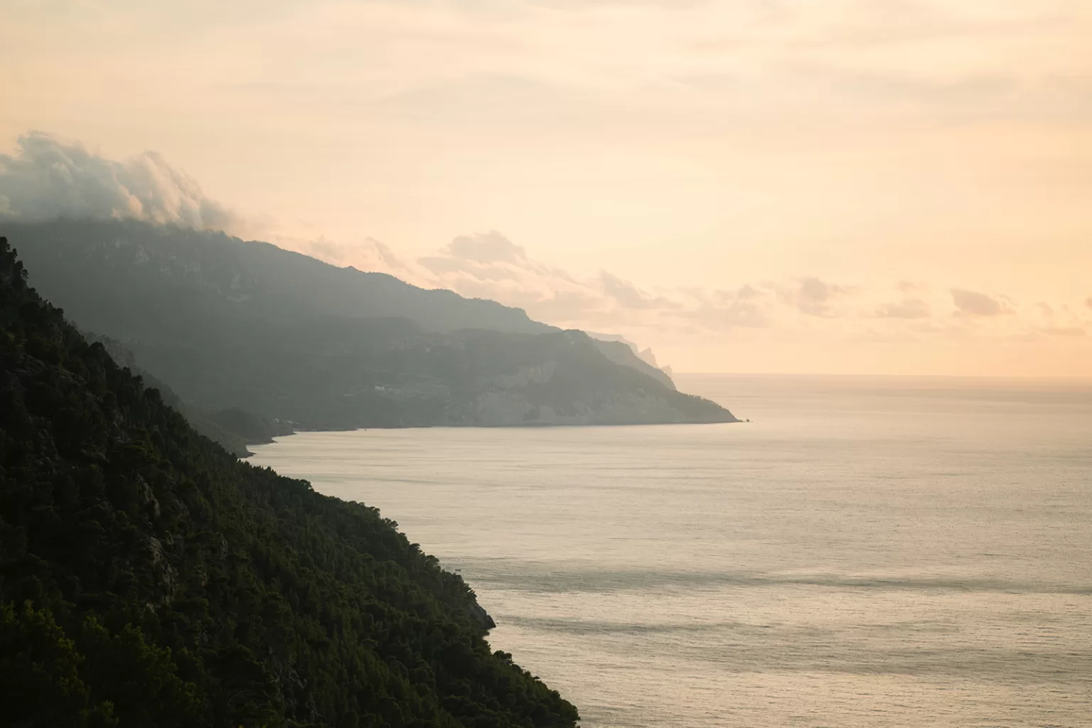 Dramatic Mallorca coastline view from Son Marroig with layered cliffs and soft evening light