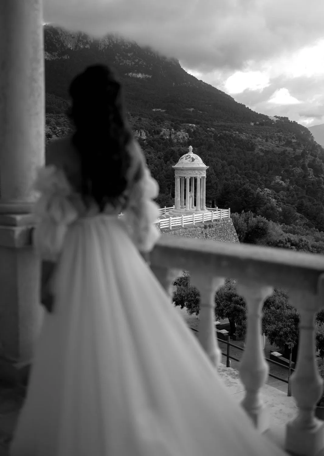 Bride and groom celebrate post-ceremony with drinks in hand at the romantic Son Marroig.