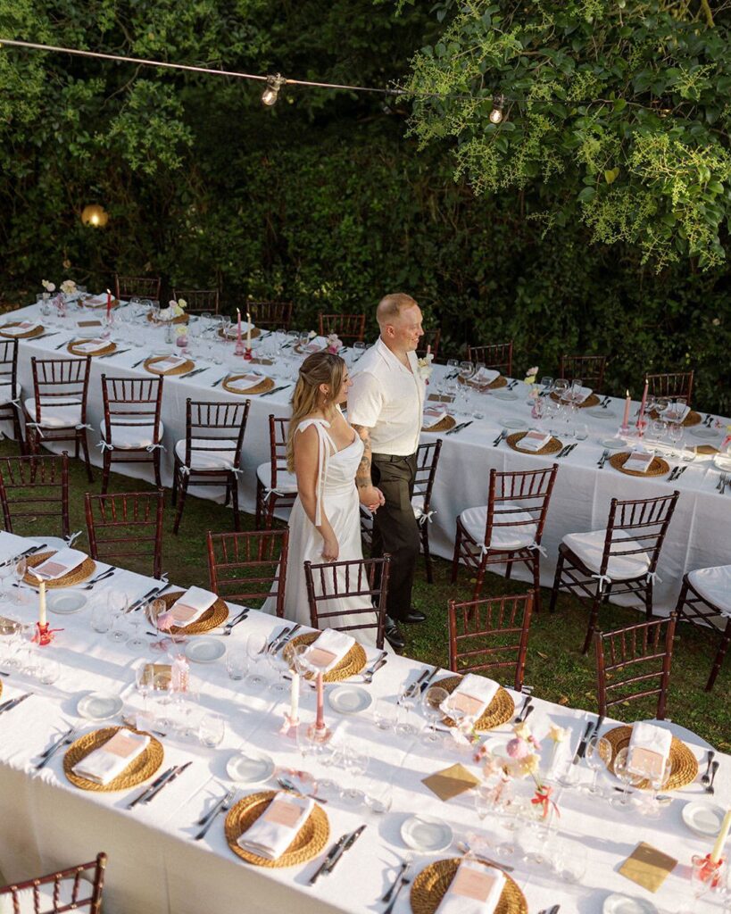 Bride and groom sharing a golden-hour moment in the gardens of Antico Convento.