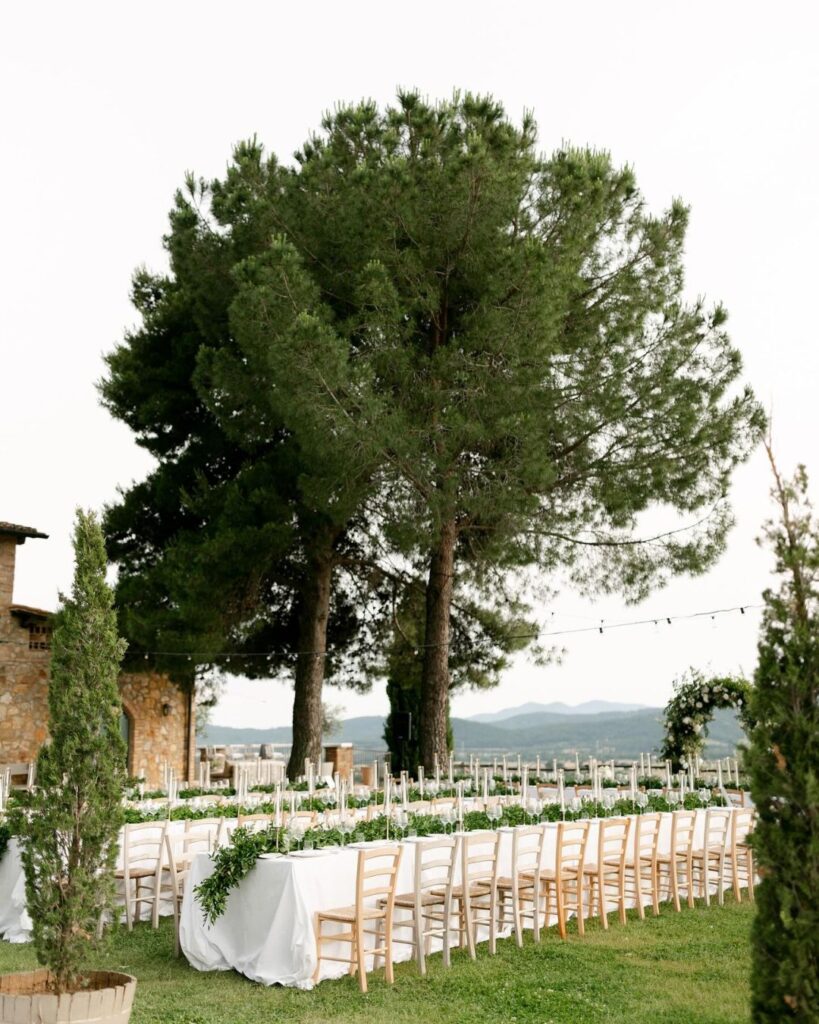 Elegant wedding table setup at Conti di San Bonifacio, styled with soft florals and rustic charm, photographed by Alex Wysocki.