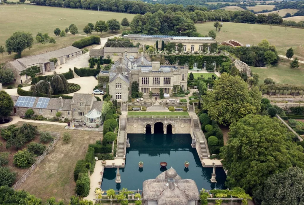 The grand entrance of Euridge Manor, surrounded by lush gardens and historic architecture.