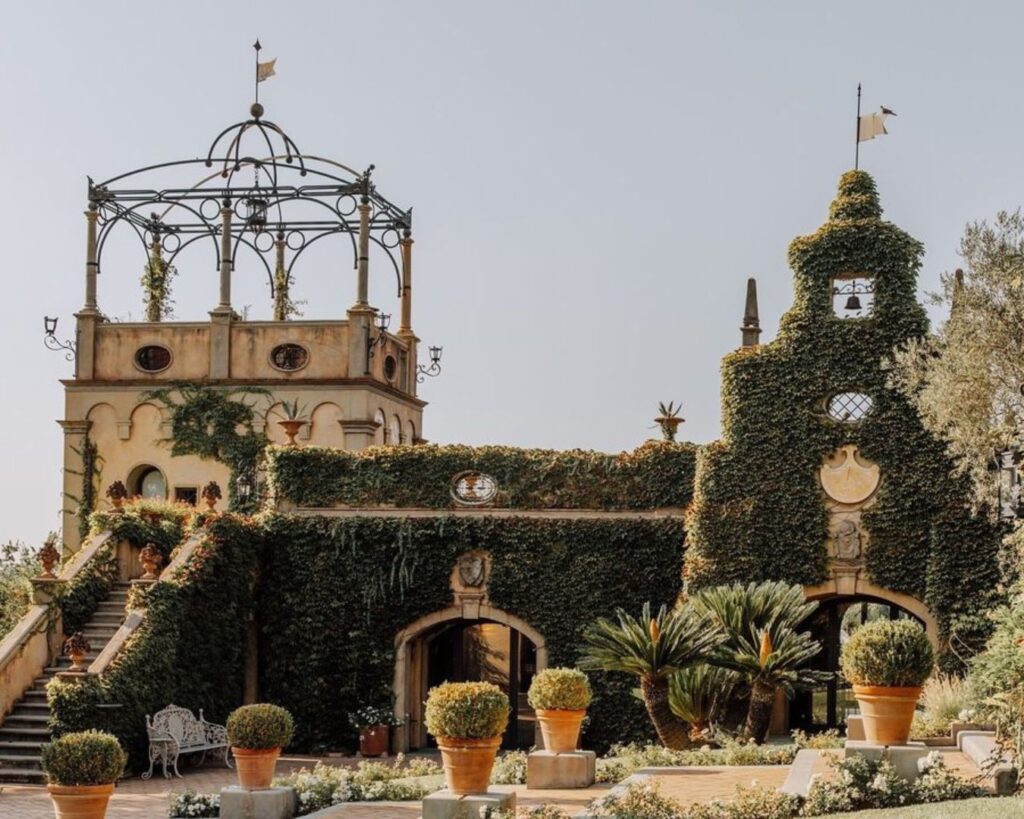 Tenuta Corbinaia exterior showcasing the stunning Tuscan villa surrounded by vineyards