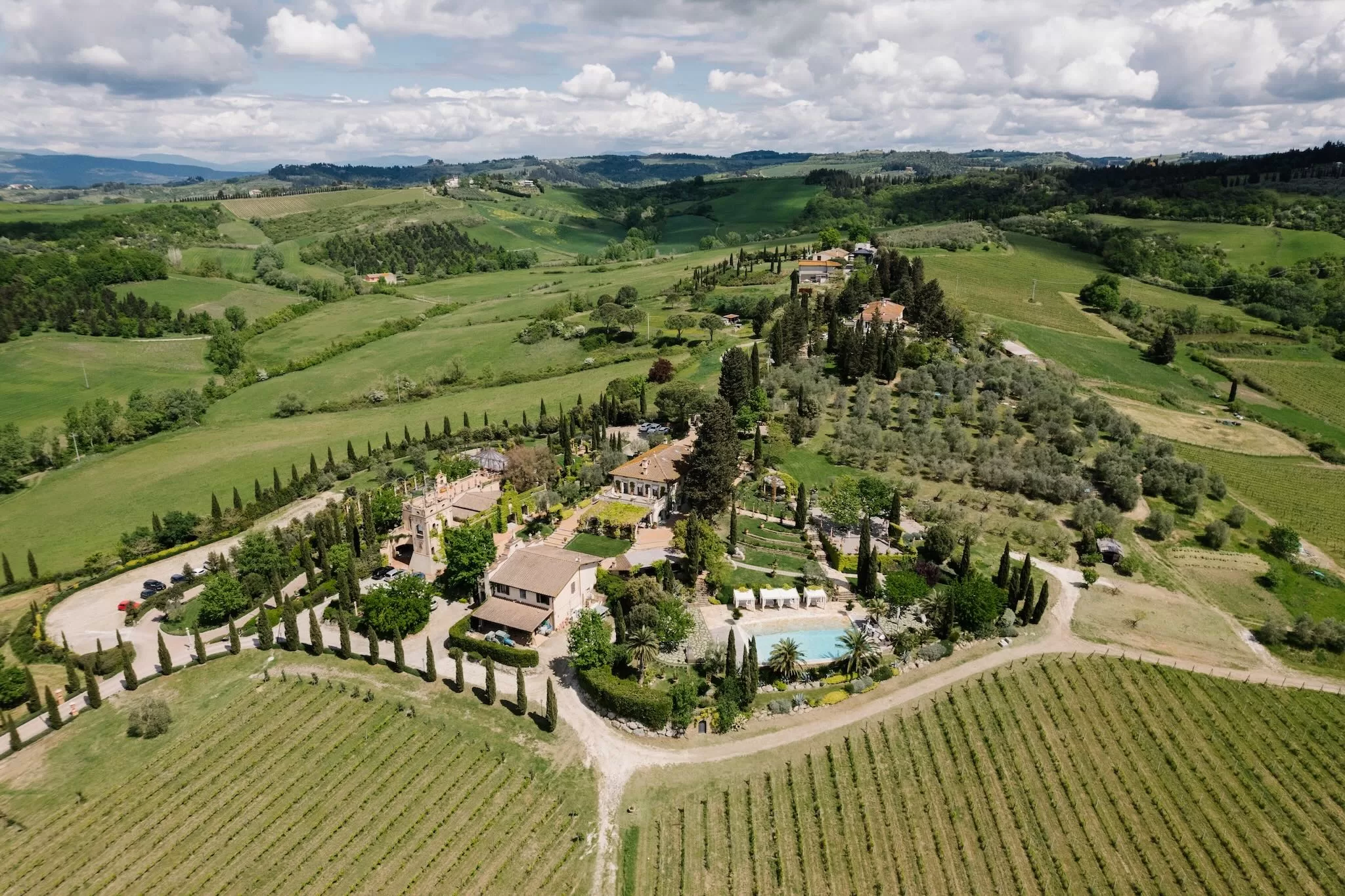 Tenuta Corbinaia exterior showcasing the stunning Tuscan villa surrounded by vineyards