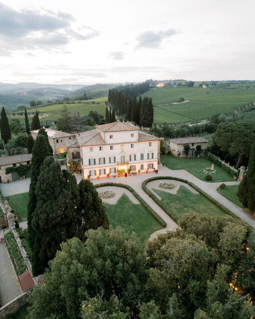 Stunning view from the exterior of Villa di Geggiano, overlooking the beautiful Tuscan landscape, captured by Linda Nari.