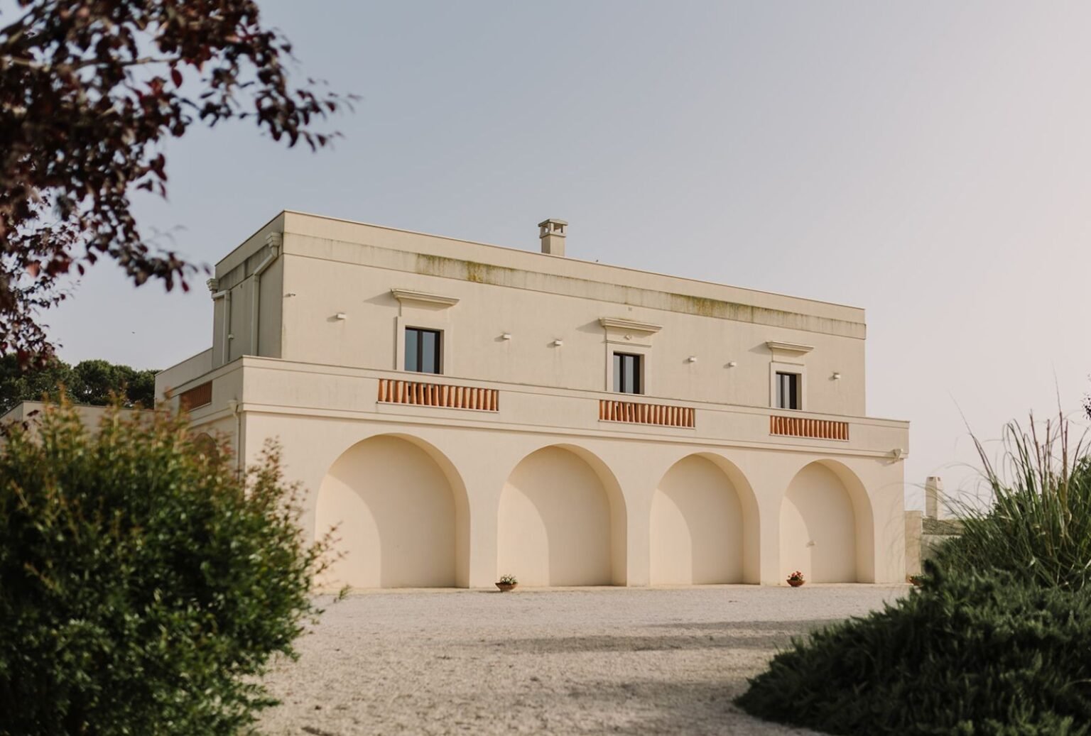The historic stone facade of Masseria Fontana di Vite, a stunning Italian wedding venue blending rustic charm with timeless elegance.