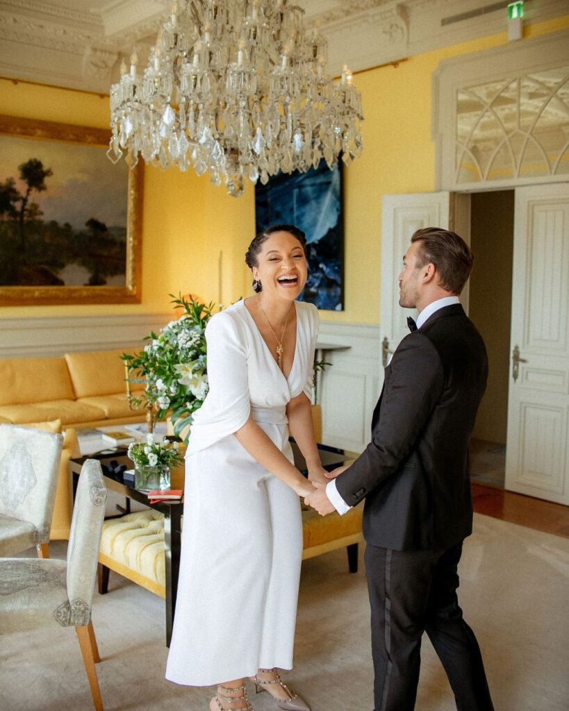 Elegant real wedding ceremony setup at Verride Palácio Santa Catarina in Lisbon, Portugal, featuring floral arrangements and chic seating.