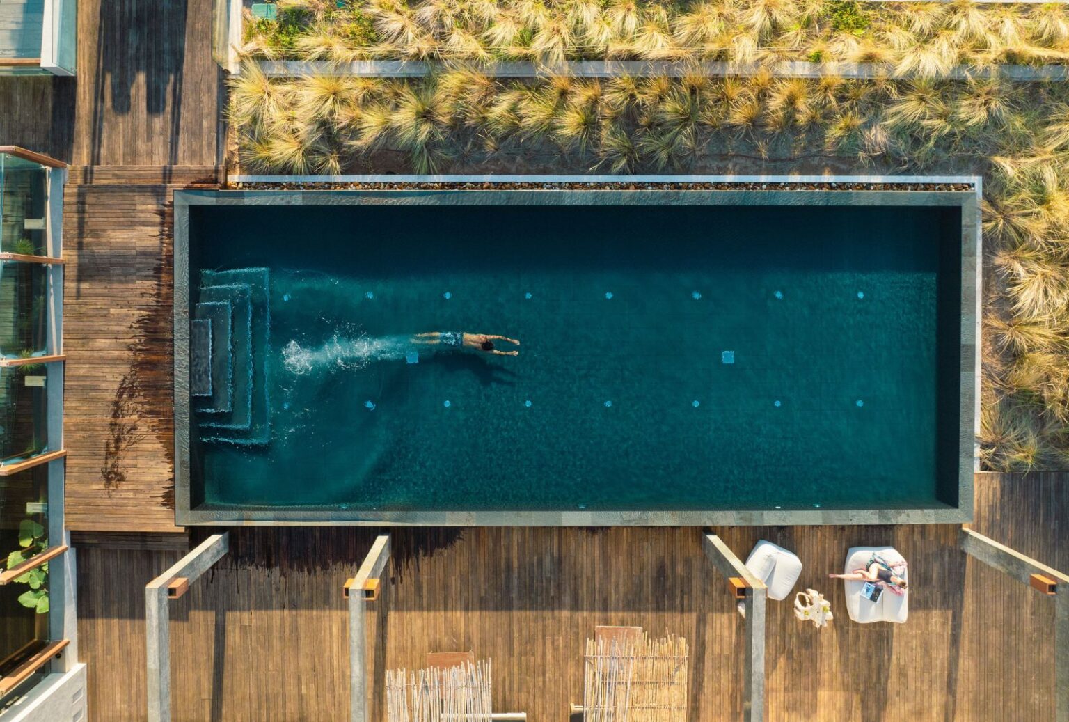 Private pool lounge area at Areias do Seixo, perfect for relaxation and unwinding.