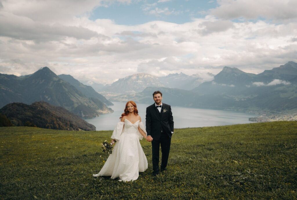 Bride and groom walking hand-in-hand, lost in a dreamy moment.