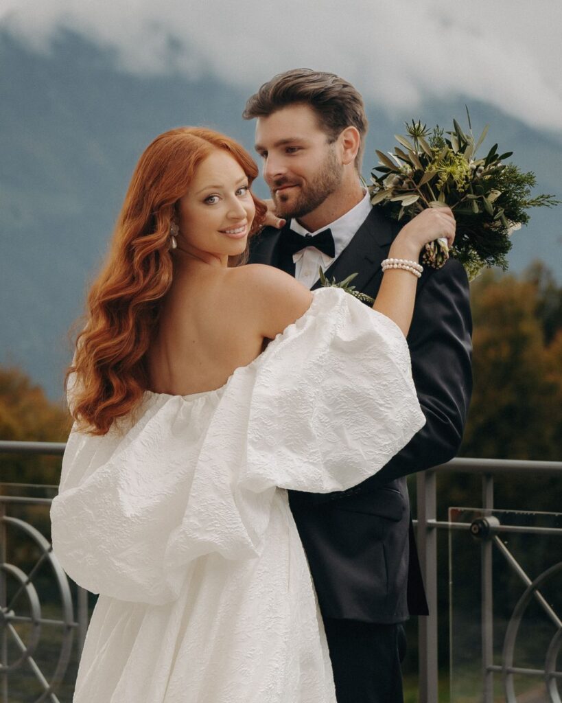 Groom smiling during the ceremony, his eyes full of joy