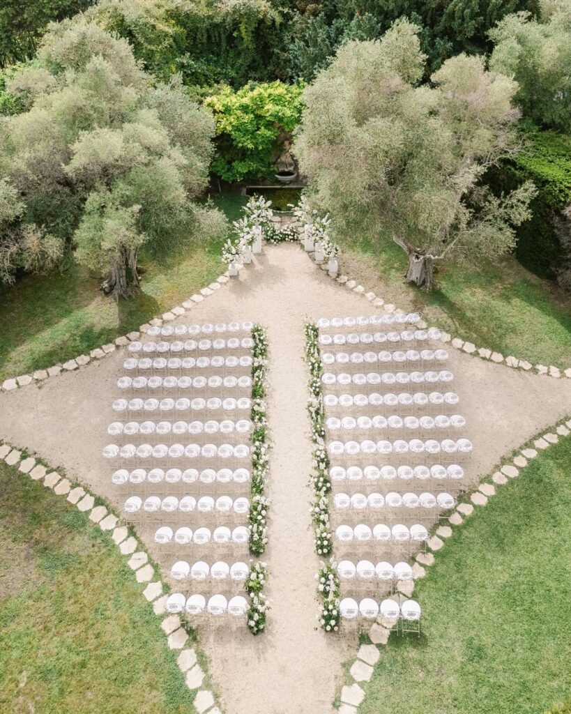 Neatly aligned ceremony chairs at Bastide du Roy, overlooking the venue’s stunning gardens.