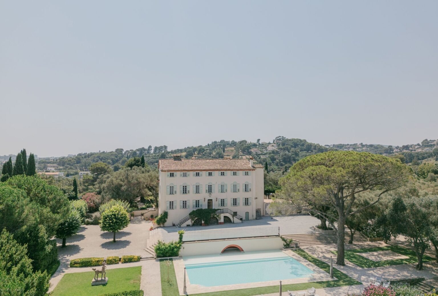 Aerial view of Bastide du Roy, showcasing the stunning estate, gardens, and surrounding landscape.