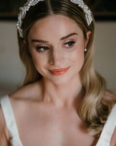 A soft and intimate close-up of the bride, sunlight filtering through the villa's windows at Rosewood Castiglion del Bosco.