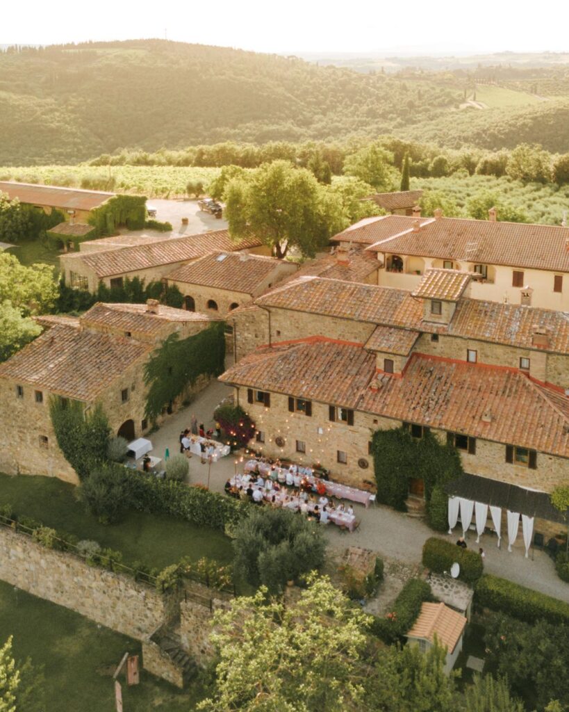 The rustic stone entrance of Quercia al Poggio, welcoming guests with historic charm.