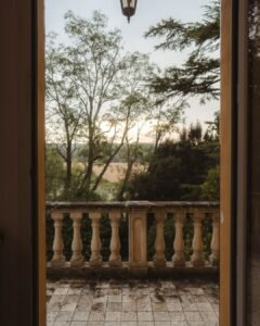 A breathtaking terrace view from Villa Donna Camilla, overlooking rolling Italian landscapes.