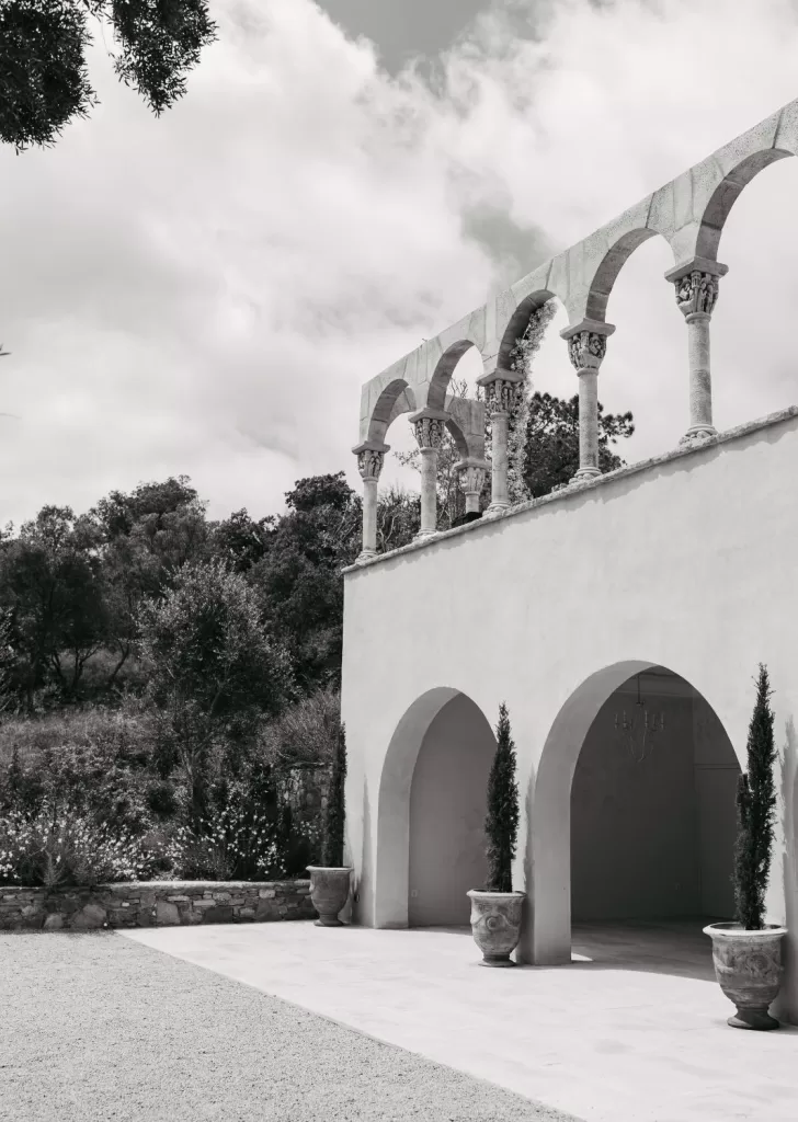 Rustic stone villa with terracotta details and lavender in bloom at Mas Torroella.