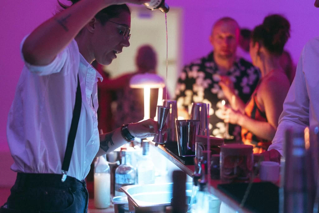Evening cocktail bar setup at Casa Sacoto, glowing with soft lighting and stylish decor.