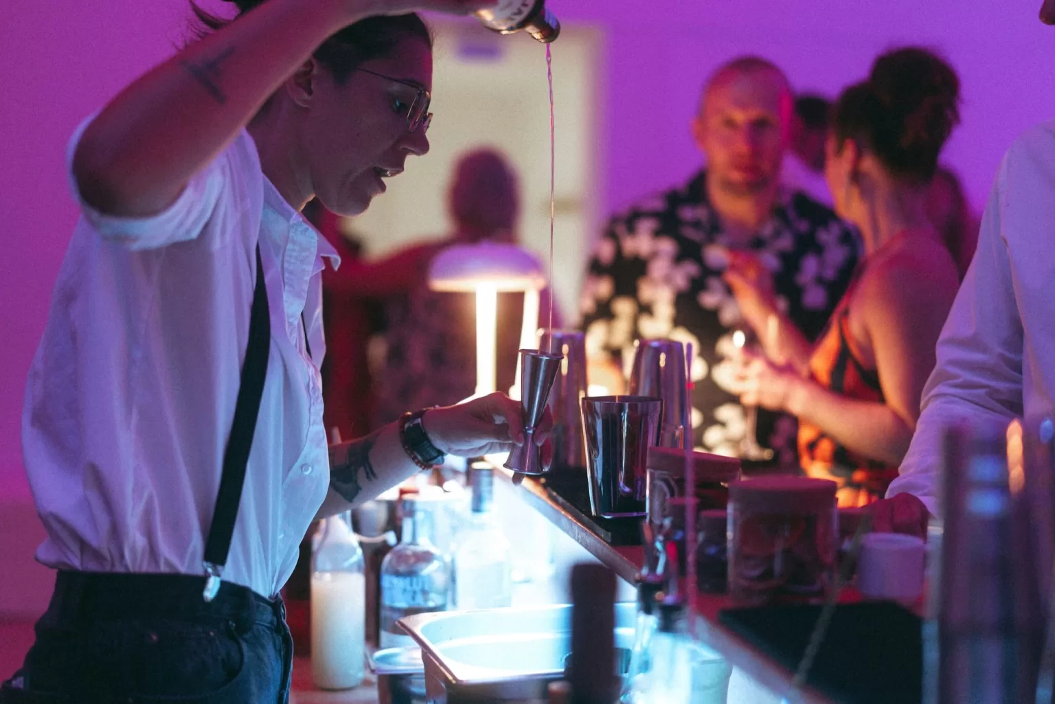 Evening cocktail bar setup at Casa Sacoto, glowing with soft lighting and stylish decor.