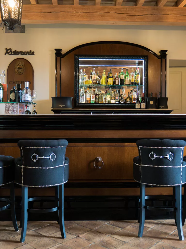 Intimate bar setting at Castello di Velona, perfect for pre-wedding gatherings.
