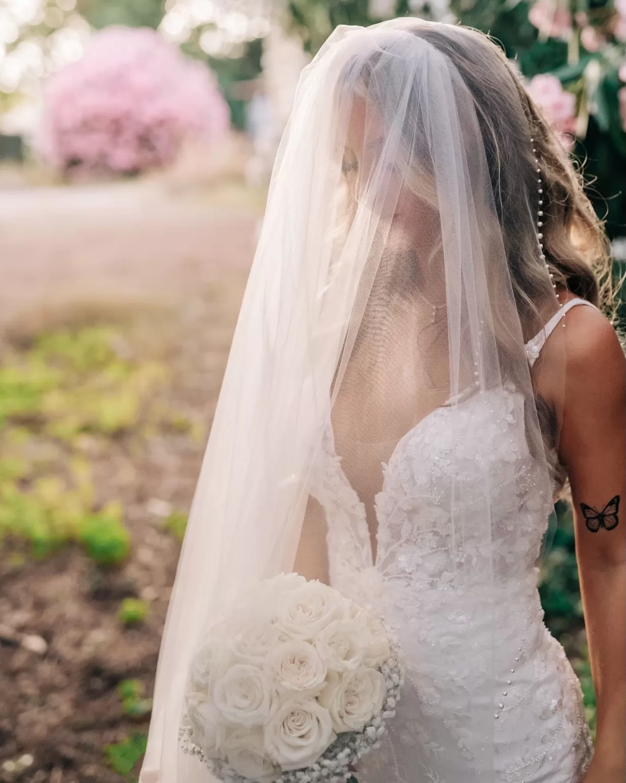 Candlelit dinner setup beneath the stars in the courtyard of Villa Ravano