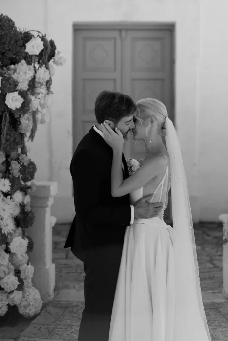 Bride and groom share emotional embrace after ceremony at Masseria San Giovanni