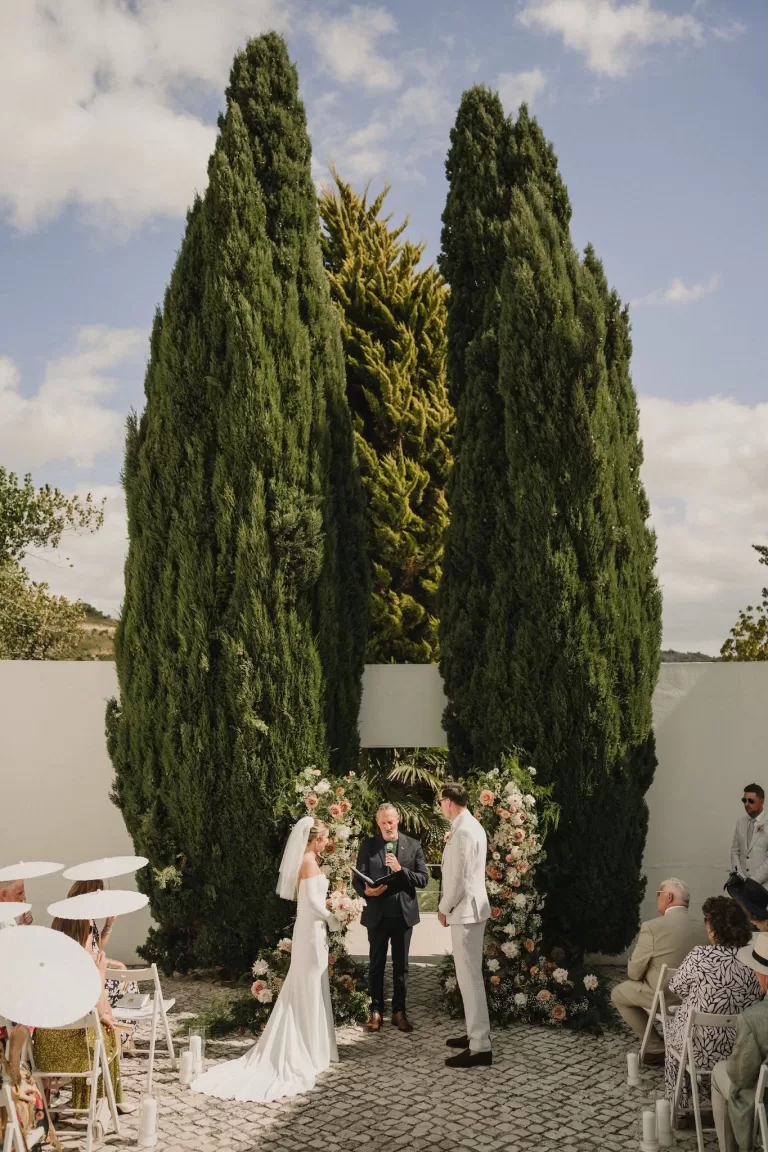 Outdoor wedding ceremony setup in the gardens of Casa Sacoto