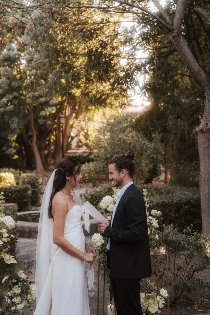 Emotional wedding vows exchange in garden ceremony at Finca Es Convent