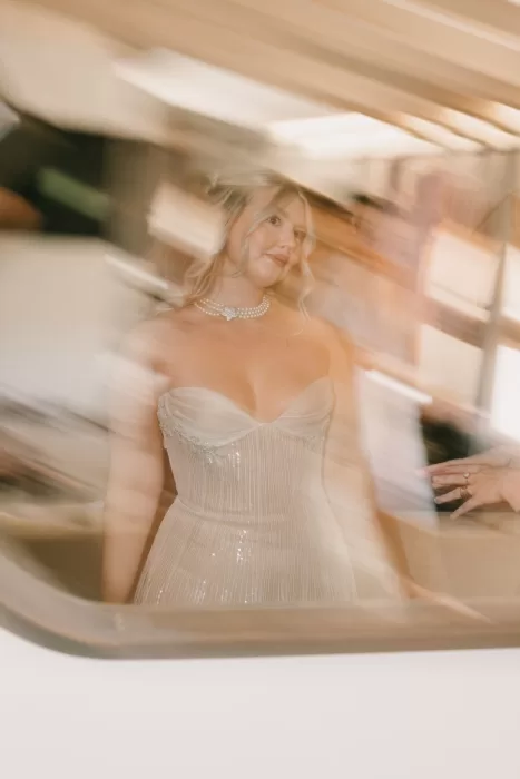 Artistic motion blur shot of the bride in a shimmering corset gown at Masia Cabellut