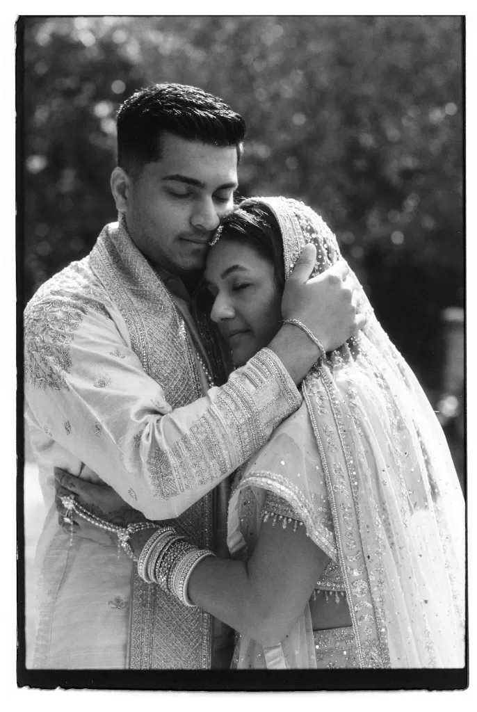 Tender black and white portrait of the couple embracing on their wedding day at Cigarral de las Mercedes.