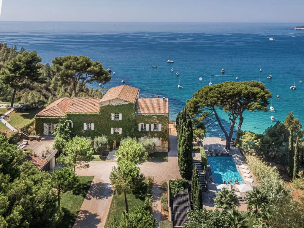 Aerial view of Domaine de Canaille with cliffside pool overlooking the Mediterranean.