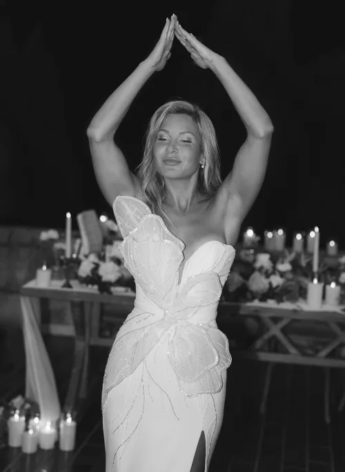Black and white portrait of bride in a butterfly-inspired gown during evening wedding at Museum of Modern Art Dubrovnik.