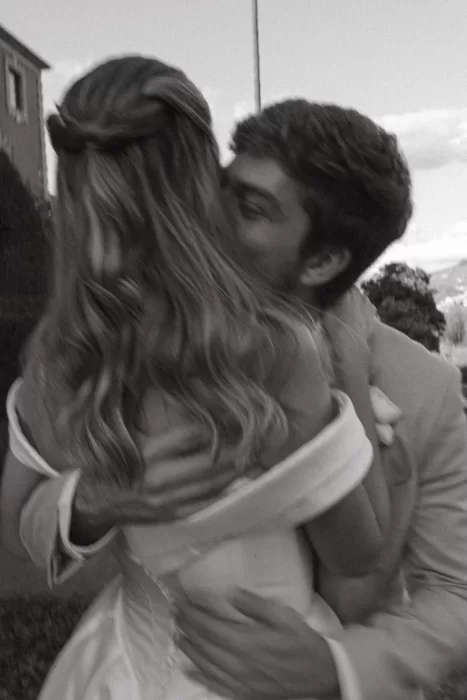 Romantic black and white moment of bride and groom embracing at Six Senses Douro Valley.