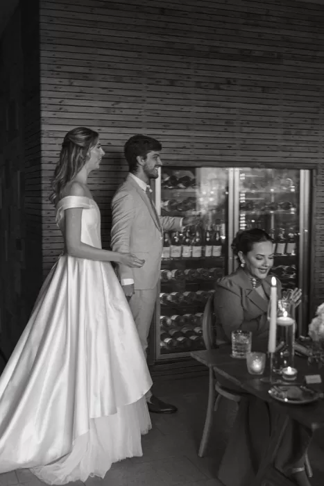 Bride and groom entering candlelit dinner reception at Six Senses Douro Valley.
