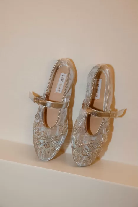 Sparkling Steve Madden bridal flats with gold floral embroidery.