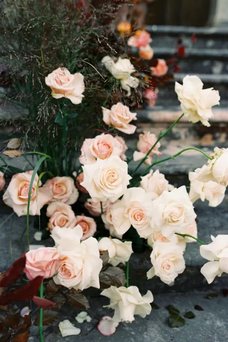 Romantic blush and cream roses arranged for a wedding at Villa Arvedi.