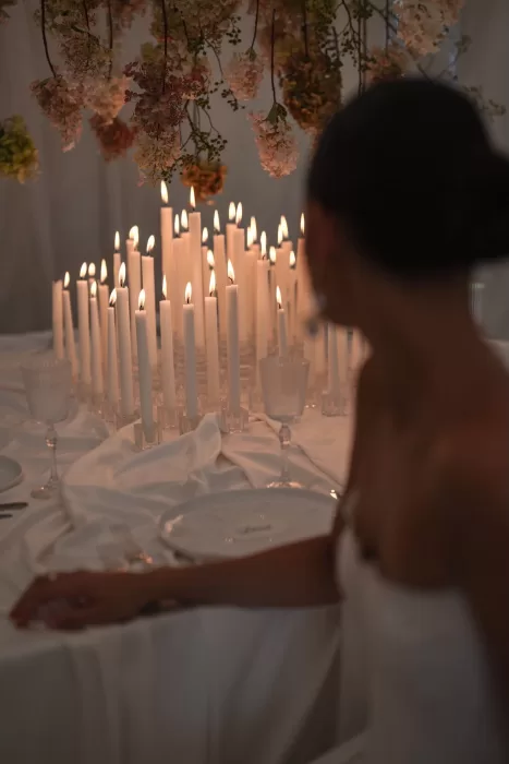 Soft candlelight illuminating the wedding dinner table at Wallalong House.