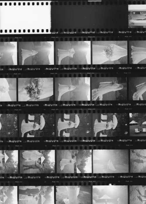 Black and white film strip featuring wedding moments captured at House Boheme.