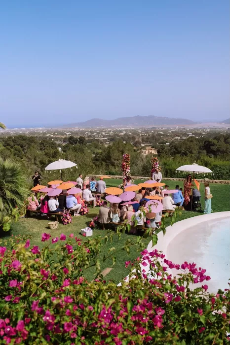 Outdoor ceremony with colorful umbrellas and panoramic views at Villa Blue Star Ibiza.