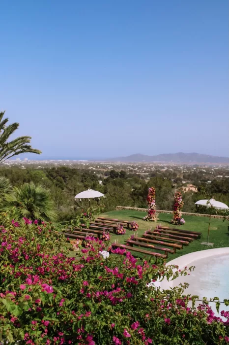Panoramic view of ceremony setup with sea and mountains from Villa Blue Star Ibiza.