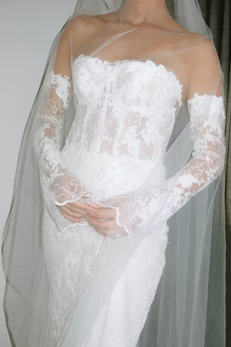 Close-up of the bride’s lace wedding dress and veil during preparations at Baja Luna.