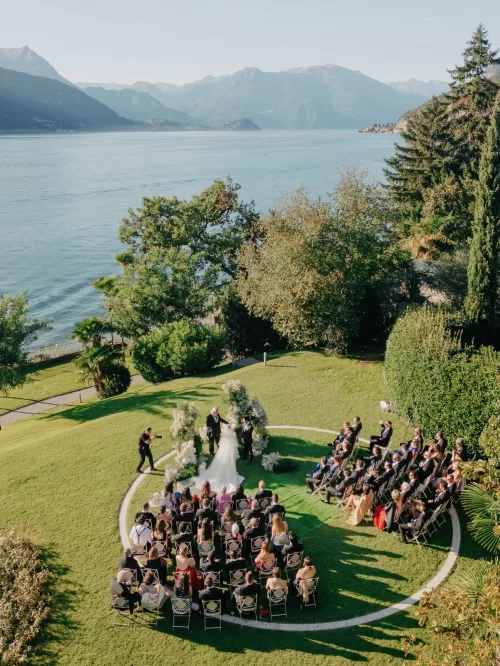 Aerial view of a circular garden wedding ceremony overlooking Lake Como at Villa Lario Resort