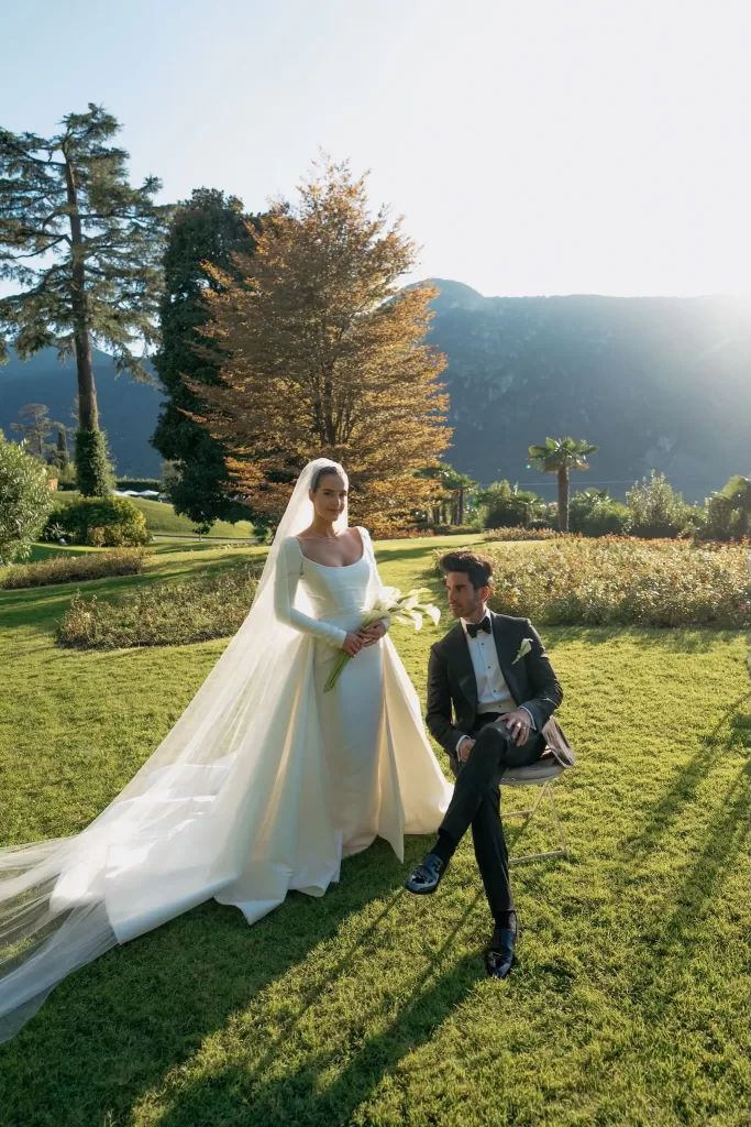 Bride and groom posing in the garden during golden hour at Villa Lario Resort