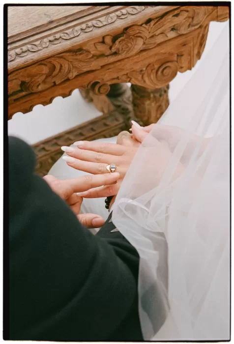 Close-up of wedding ring exchange during the ceremony at Boturich Castle.