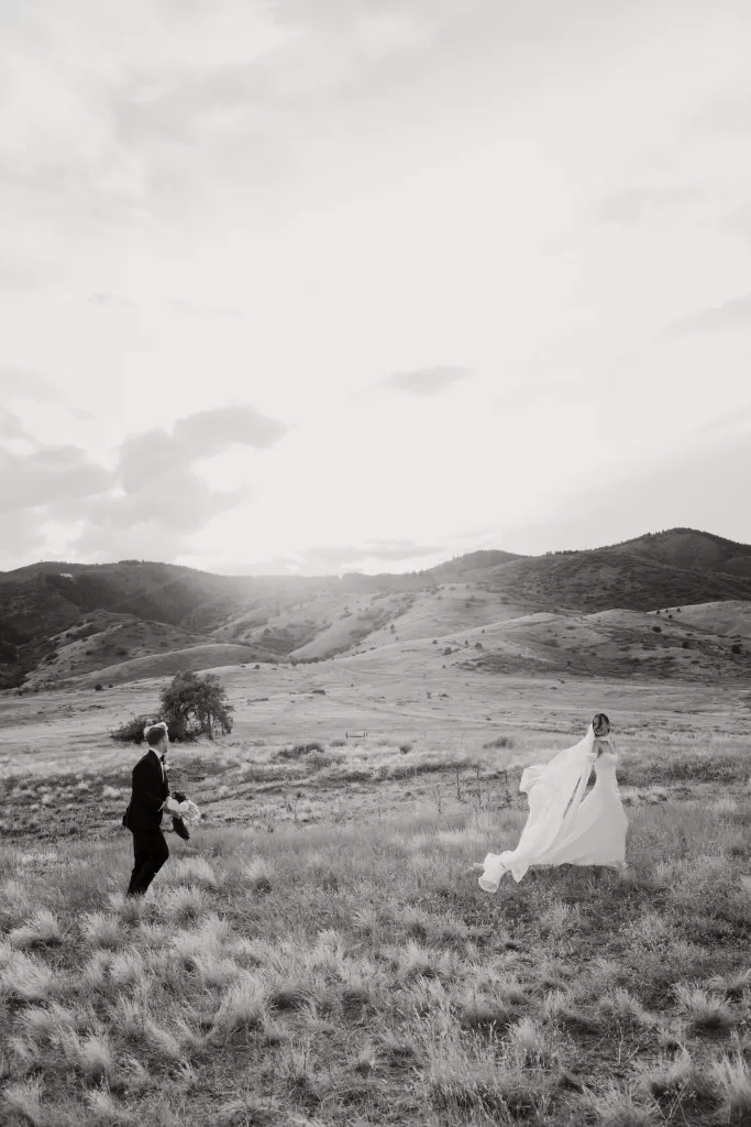 Black and white portrait of the couple in the Colorado landscape near The Manor House.