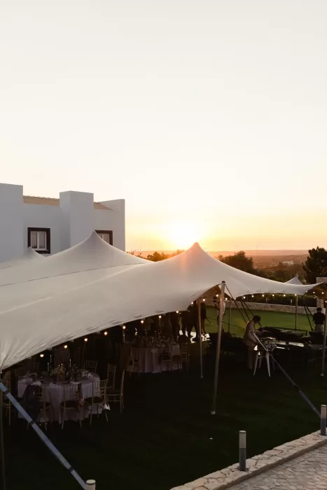 Sunset falling over the tented reception lawn at Casa Monte Cristo Collection.