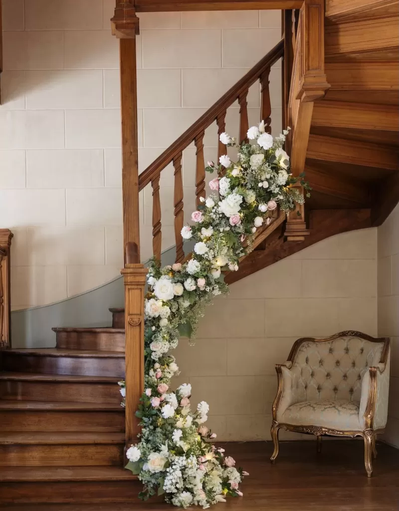 chateau-couronne-staircase-flowers